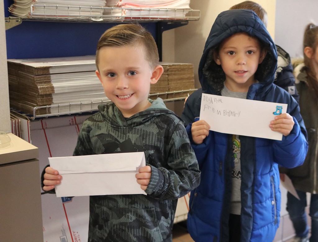 Two boys with their letters to the North Pole