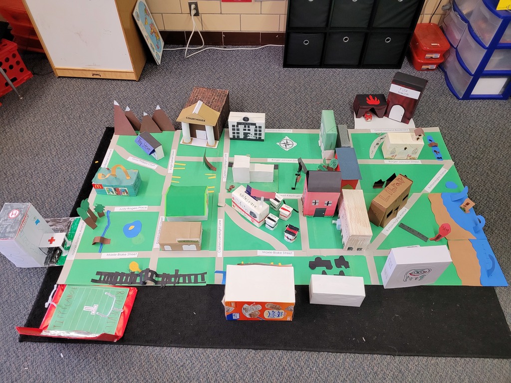 First graders learned about communities and regions and built their own town.