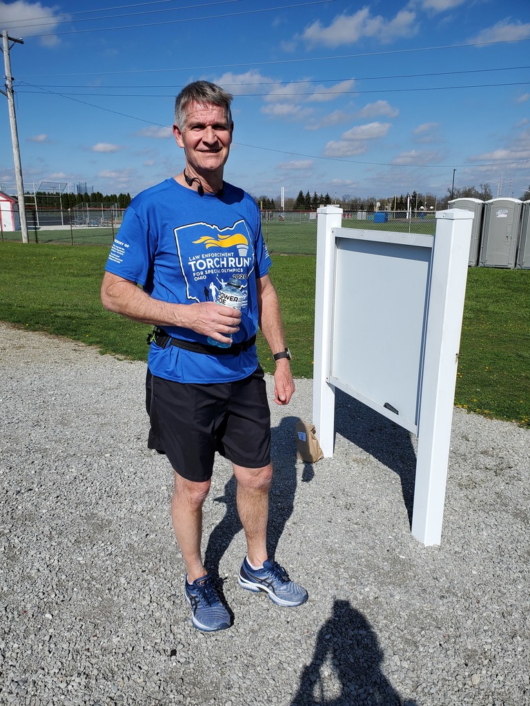 DARE Officer Dan Rittenhouse works out with staff to prepared for a 5K race.