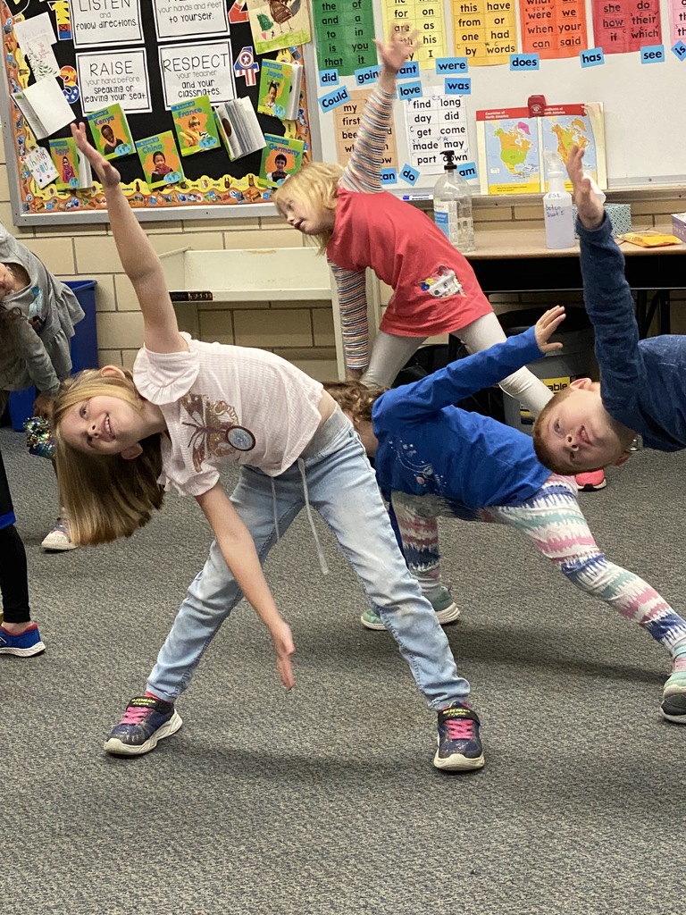 Kindergarten students exercising and having fun.