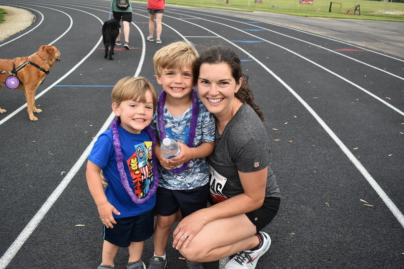 A mom with her two little runners.