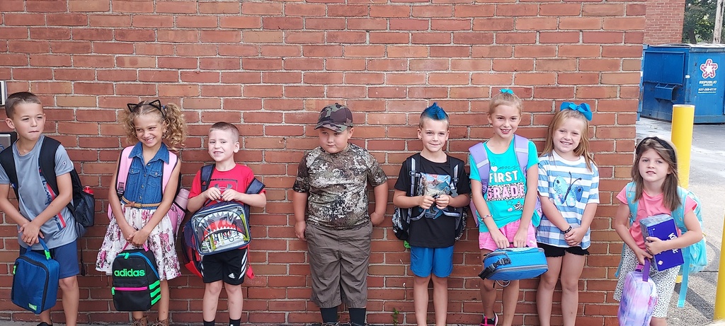 First grade students line up for the first day of the new school year.