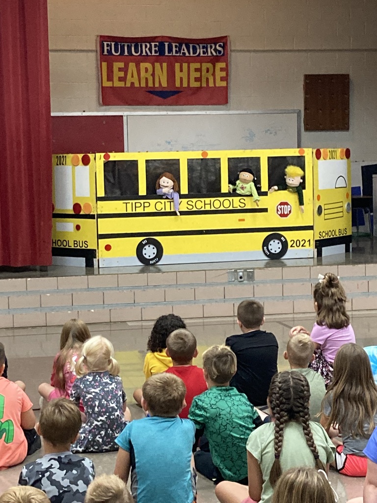 Students learn about bus safety.