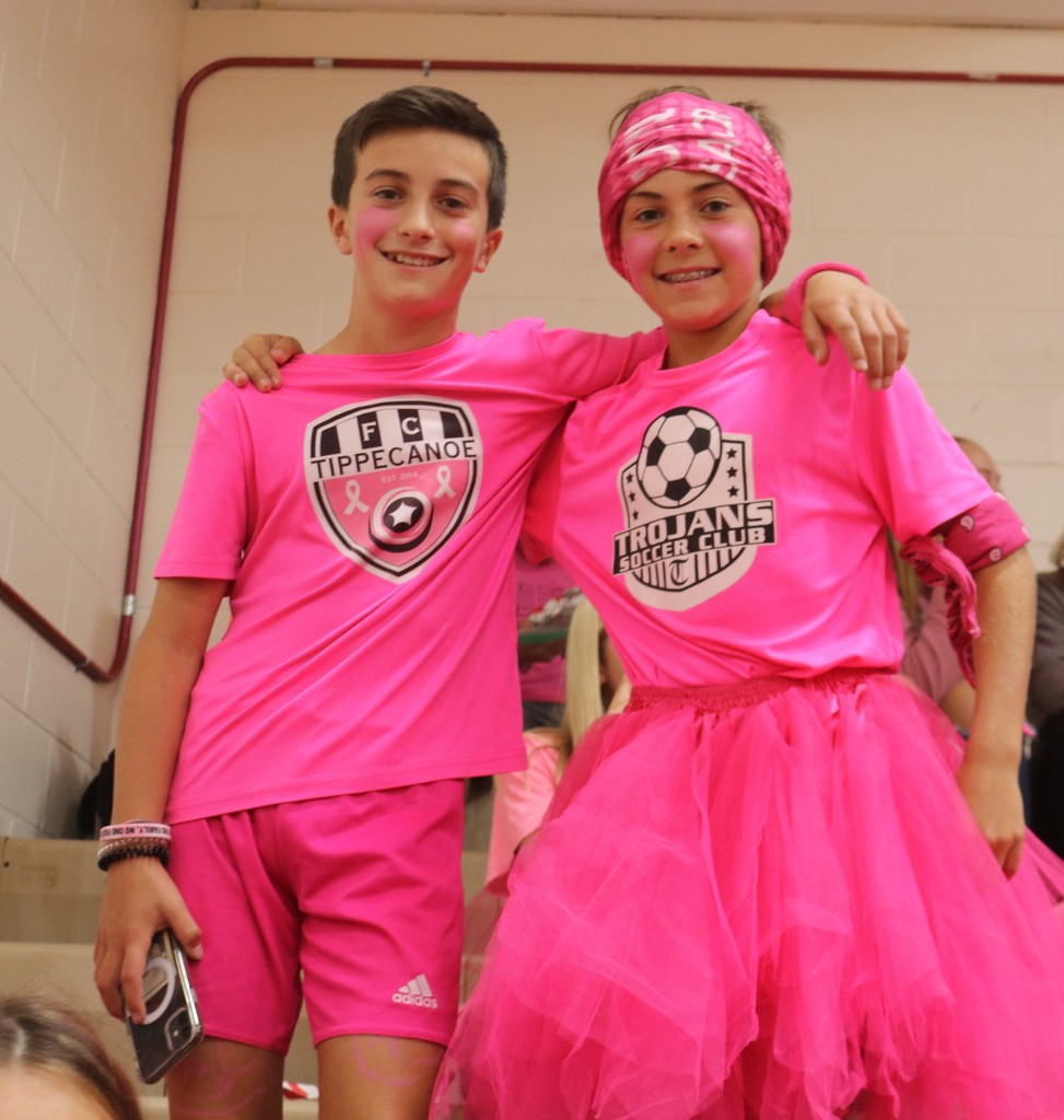 A pair of  TM S students in pink.