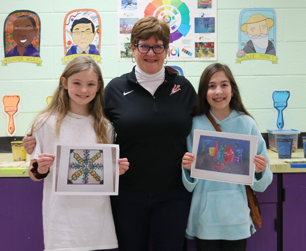 LT Ball art teacher Joan Lucas with 2 award-winning young artists