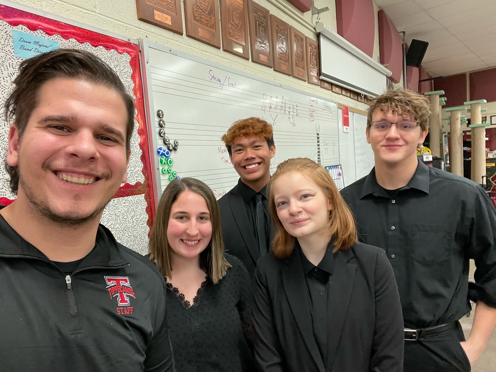 Tippecanoe High School musicians who played in the honor band take a selfie with Stephen Monath.