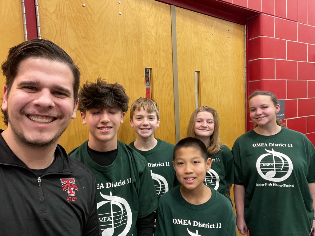 Tippecanoe Middle School students who played in the honor band are with with Stephen Monath