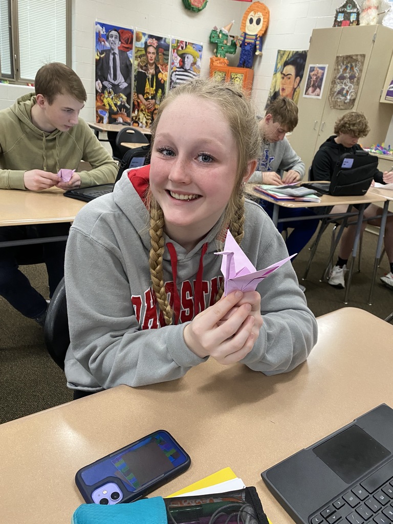 THS students making origami cranes.