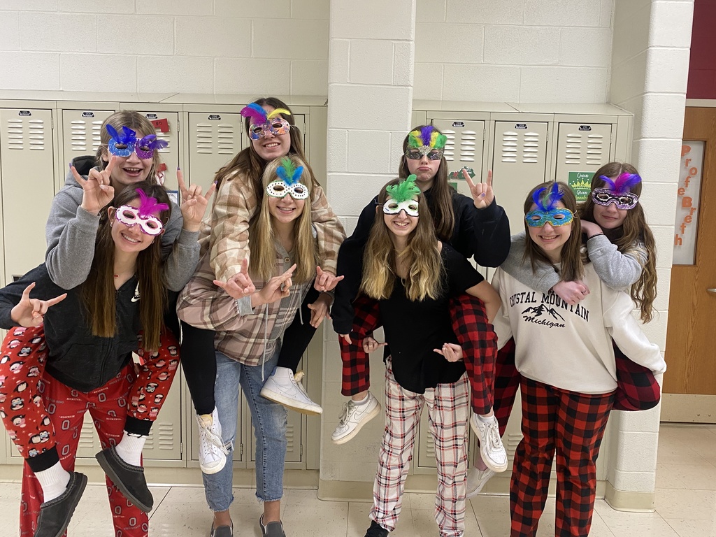 THS students show off their masks they made.  