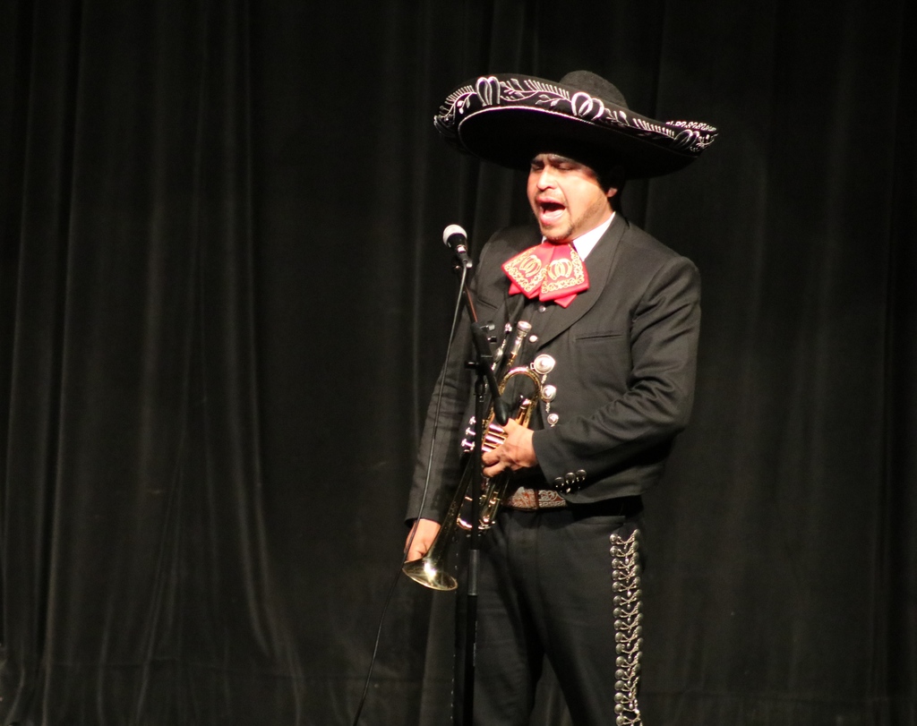 Performer from the Mariachi sings at THS
