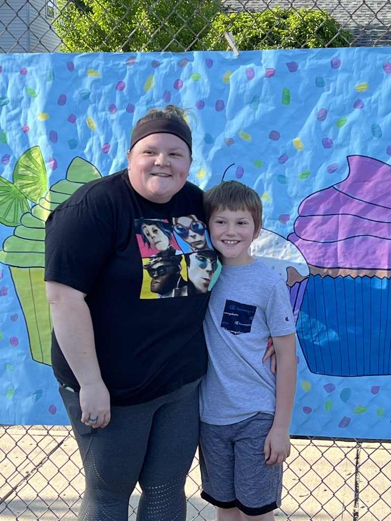A Broadway student and his guest at Muffins in the Morning