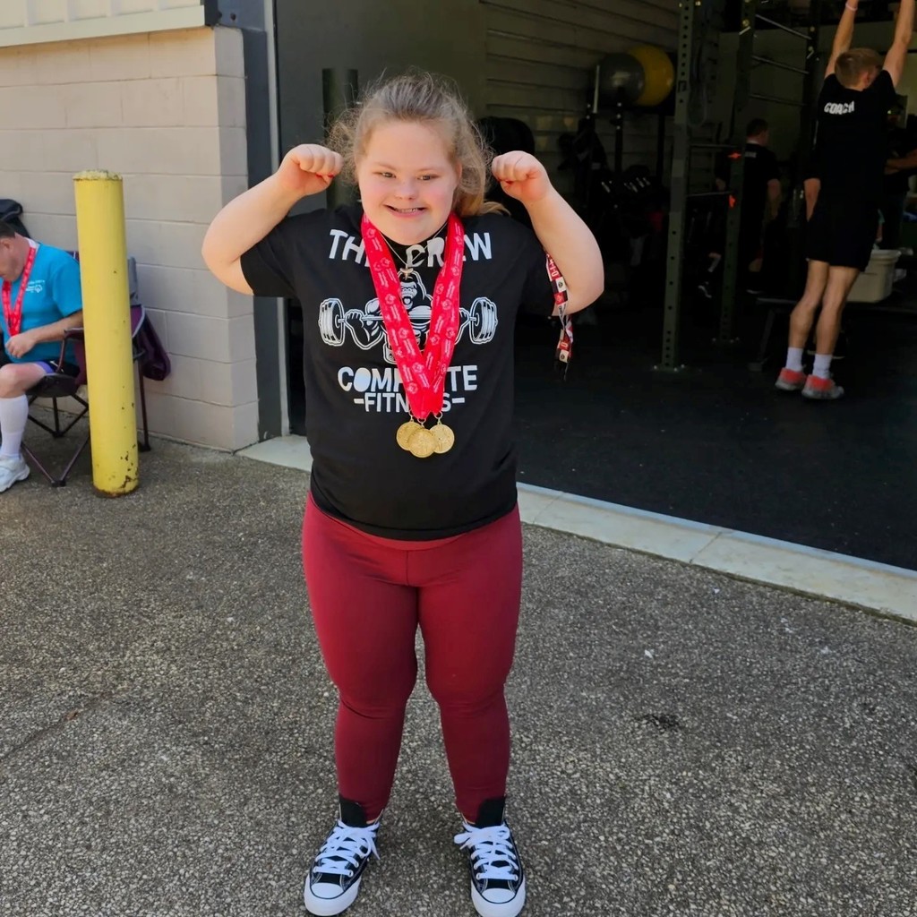 THS student Justine shows off her medal she earned.