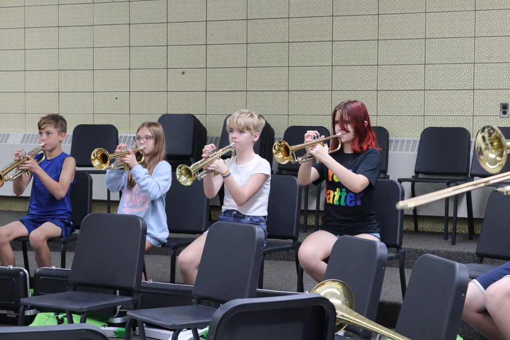 6th Graders practice their instruments