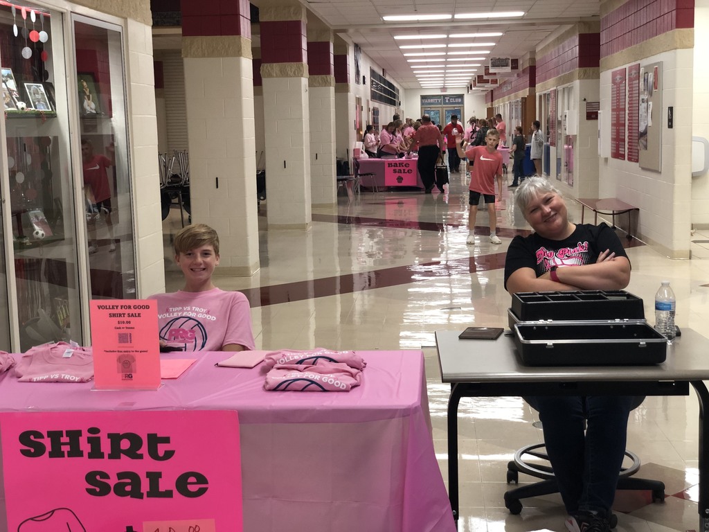 Selling t-shirts.