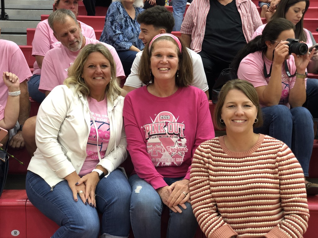 Three TMS staff members at the volleyball game.